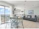 Studio living room with balcony view and seating at 5905 South Kings Hwy. # 908 C, Myrtle Beach, SC 29575