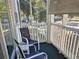 Private screened balcony with seating for relaxing outdoors at 601 Hillside Ave. N # 1623, North Myrtle Beach, SC 29582