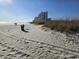 Sandy beach with oceanfront high-rise buildings at 601 Hillside Ave. N # 1623, North Myrtle Beach, SC 29582