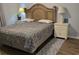 King bedroom with updated flooring and nightstands at 601 Hillside Ave. N # 1623, North Myrtle Beach, SC 29582