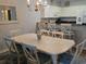 Dining area with view into kitchen and seating for eight at 601 Hillside Ave. N # 1623, North Myrtle Beach, SC 29582