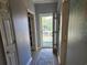 Bright hallway with access to balcony at 601 Hillside Ave. N # 1623, North Myrtle Beach, SC 29582