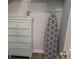 Convenient laundry closet with dresser and ironing board at 601 Hillside Ave. N # 1623, North Myrtle Beach, SC 29582