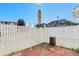 Enclosed brick back patio with gate access, offering privacy and a tranquil outdoor space at 618 3Rd Ave. S # 4D, North Myrtle Beach, SC 29582