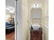 Charming powder room featuring a vessel sink and a decorative mirror at 618 3Rd Ave. S # 4D, North Myrtle Beach, SC 29582