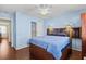 Comfortable bedroom featuring a bed, ceiling fan, and closet at 618 3Rd Ave. S # 4D, North Myrtle Beach, SC 29582