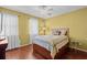 Cozy bedroom featuring tropical-themed bedding and natural light at 618 3Rd Ave. S # 4D, North Myrtle Beach, SC 29582