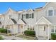 Charming townhome featuring a welcoming entrance and well-maintained landscaping at 618 3Rd Ave. S # 4D, North Myrtle Beach, SC 29582