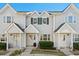 Well-maintained townhomes featuring inviting entrances, landscaping, and a community feel at 618 3Rd Ave. S # 4D, North Myrtle Beach, SC 29582