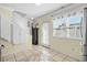 Bright kitchen offering stainless appliances, tile floor, and exterior access at 618 3Rd Ave. S # 4D, North Myrtle Beach, SC 29582
