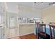 Cozy eat-in kitchen with stainless appliances and access to the backyard at 618 3Rd Ave. S # 4D, North Myrtle Beach, SC 29582