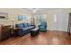 Comfortable living room with hardwood floors, neutral tones, and cozy furniture at 618 3Rd Ave. S # 4D, North Myrtle Beach, SC 29582
