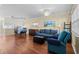 Bright living room features hardwood floors, beach art and natural light at 618 3Rd Ave. S # 4D, North Myrtle Beach, SC 29582