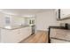 Modern kitchen with white cabinets, granite countertops and stainless steel appliances at 632 Grateful Dr., Little River, SC 29566
