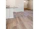 Light and bright living room with hardwood floors and access to the kitchen at 632 Grateful Dr., Little River, SC 29566