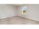 Bedroom with neutral wall and carpet flooring, plus a window at 7015 Shooting Star Way, Myrtle Beach, SC 29579