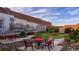 Charming community courtyard with red tables and a train mural at 736 Rupert Dr, Conway, SC 29526