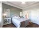 Spacious bedroom with a queen bed, access to a bathroom and ample closet space at 804 Crumpet Ct. # 1151, Myrtle Beach, SC 29579