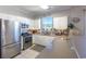White cabinets, stainless steel appliances, and a stylish backsplash at 804 Crumpet Ct. # 1151, Myrtle Beach, SC 29579