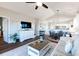 Open-concept living area with a comfortable sofa and a large TV at 804 Crumpet Ct. # 1151, Myrtle Beach, SC 29579
