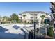 Community pool with surrounding patio furniture and building in background at 804 Crumpet Ct. # 1151, Myrtle Beach, SC 29579