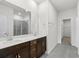 Double vanity bathroom with a large shower and walk-in closet at 847 Cypress Preserve Circle, Longs, SC 29568
