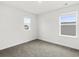 Bright bedroom featuring neutral walls and carpet at 847 Cypress Preserve Circle, Longs, SC 29568