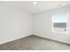 Spacious bedroom with large window and carpet at 847 Cypress Preserve Circle, Longs, SC 29568