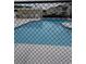 Community pool viewed through a chain link fence at 8885 Grove Park Dr. # F, Surfside Beach, SC 29575