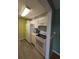 Kitchen features white cabinets and modern appliances at 8885 Grove Park Dr. # F, Surfside Beach, SC 29575