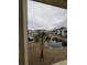 Community pond view from screened porch at 8885 Grove Park Dr. # F, Surfside Beach, SC 29575