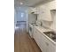 White kitchen with granite countertops and stainless steel appliances at 905 Ridge St., Conway, SC 29526