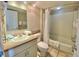 Well-lit bathroom featuring a shower-tub combination and tile flooring at 9550 Shore Dr. # 1226, Myrtle Beach, SC 29572