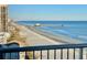 Scenic beach view from balcony, showcasing the pier and blue ocean at 9550 Shore Dr. # 1226, Myrtle Beach, SC 29572