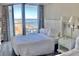 Bright bedroom with two double beds and beachfront balcony access and amazing ocean views at 9550 Shore Dr. # 1226, Myrtle Beach, SC 29572