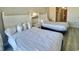Bright bedroom with a queen bed and a small kitchenette with ocean view at 9550 Shore Dr. # 1226, Myrtle Beach, SC 29572