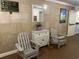 Hallway includes Adirondack chairs and small table to sit and relax at 9550 Shore Dr. # 1226, Myrtle Beach, SC 29572