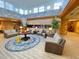 Lobby with high ceilings, comfortable seating, and refined decor offers a grand sense of arrival at 9550 Shore Dr. # 1226, Myrtle Beach, SC 29572