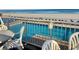 Pool deck overlooking a swimming pool and the scenic ocean view at 9550 Shore Dr. # 1226, Myrtle Beach, SC 29572