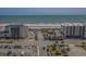 Aerial view of beachfront property with parking and pool at 107 Toby Ct. # 203-B, North Myrtle Beach, SC 29582