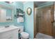 Bathroom features a shower and updated vanity at 107 Toby Ct. # 203-B, North Myrtle Beach, SC 29582