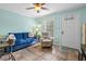 Bright living room with comfy seating and tiled floors at 107 Toby Ct. # 203-B, North Myrtle Beach, SC 29582