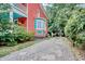 Gravel pathway leading to charming red house at 113 Meeting St., Georgetown, SC 29440