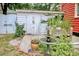 Charming white shed with garden accents at 113 Meeting St., Georgetown, SC 29440