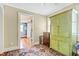 Hallway with green armoire and view of bathroom at 113 Meeting St., Georgetown, SC 29440