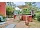 Relax in this backyard hot tub with patio umbrella at 113 Meeting St., Georgetown, SC 29440