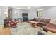 Living Room with hardwood floors, brown leather couch, and rocking chair at 113 Meeting St., Georgetown, SC 29440