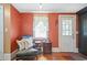 Cozy sitting area with a comfortable armchair and side table at 113 Meeting St., Georgetown, SC 29440