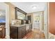 A built-in wet bar with granite countertop and microwave at 113 Meeting St., Georgetown, SC 29440