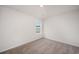 Well-lit bedroom with a window offering natural light and carpeted floors at 1137 Black Lake Way, Conway, SC 29526